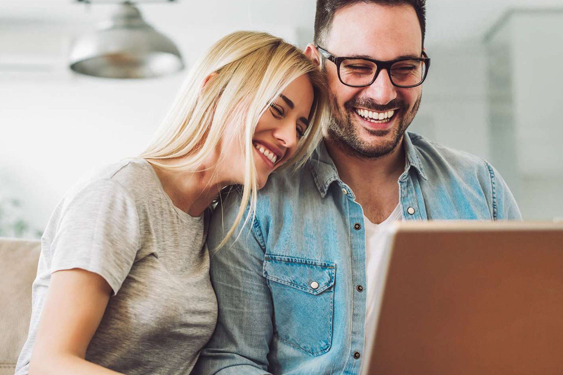 Couple reviewing home technology options together